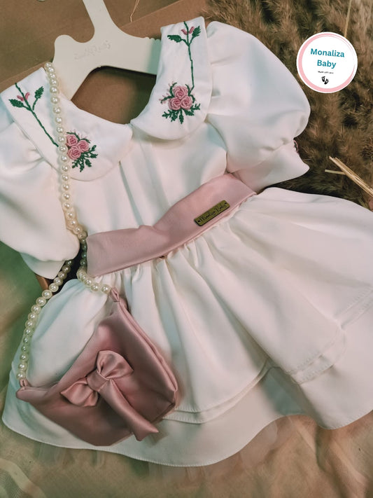 فستان ابيض مع تطريز يدوي مميز